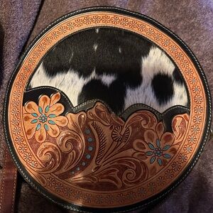 Round Floral Embossed Cowhide Bag